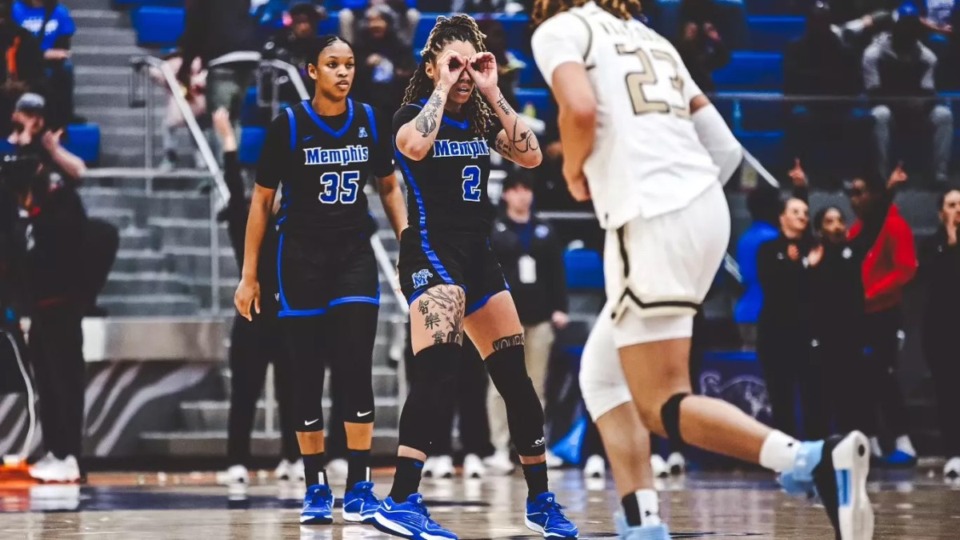 <strong>Aliyah Green (35) and Madison Griggs (2) keep an eye on the crowd Saturday at the Elma Roane Fieldhouse. The Tigers defeated the University of Alabama - Birmingham, 82-61.</strong> (Matthew A. Smith/Memphis Athletics)