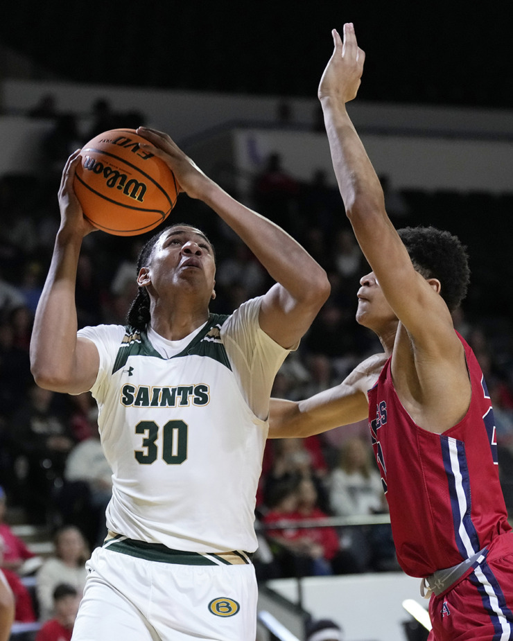 <strong>Briarcrest Christian forward Fred Smith (30) drives against Brentwood Academy&rsquo;s Ethan Hillsman, right, during the first half of the Division II-AA championship basketball game Saturday, March 2, 2024, in Cookeville, Tenn.</strong> (Mark Humphrey/Special to The Daily Memphian)