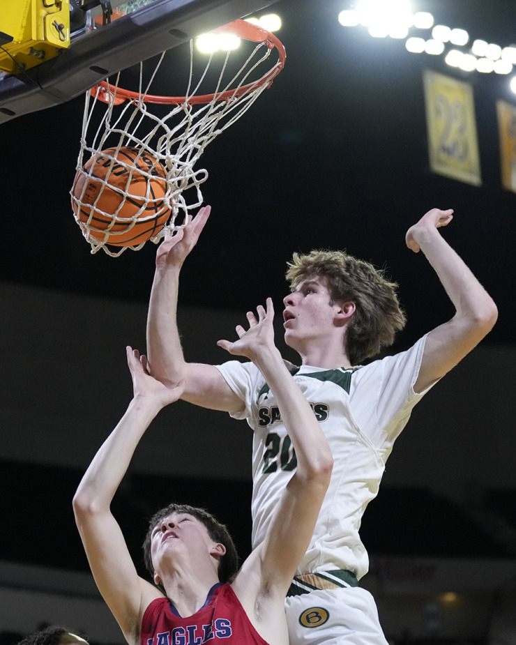 <strong>Briarcrest Christian forward Jackson Grisham (20) scores over Brentwood Academy's George Macintyre during the first half of the Division II-AA championship basketball game Saturday, March 2, 2024, in Cookeville, Tenn.</strong> (Mark Humphrey/Special to The Daily Memphian)