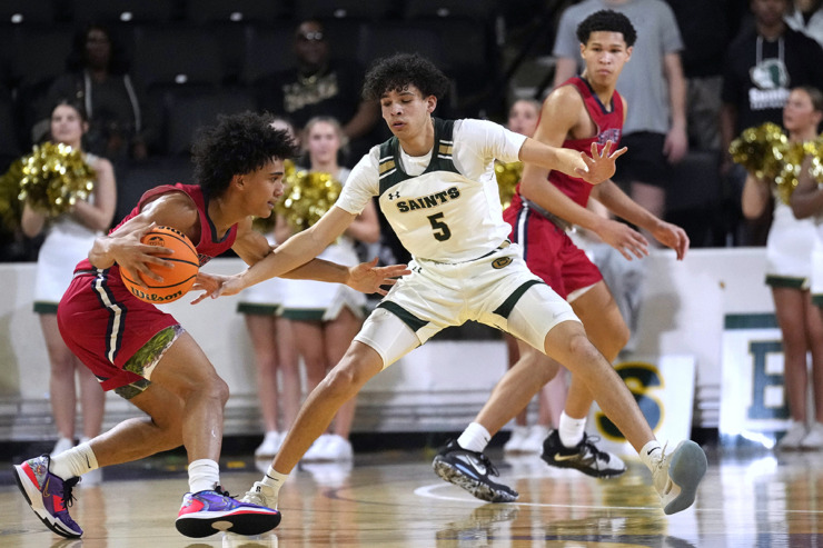 <strong>Briarcrest Christian guard Landon Rogers (5) guards Brentwood Academy's Tyler Tanner, left, during the first half of the Division II-AA championship basketball game Saturday, March 2, 2024, in Cookeville, Tenn.</strong> (Mark Humphrey/Special to The Daily Memphian)