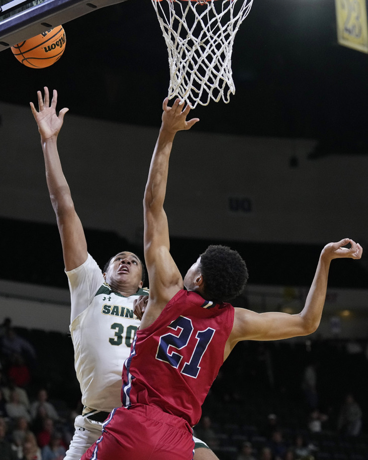 <strong>Briarcrest Christian forward Fred Smith (30) shoots against Brentwood Academy's Ethan Hillsman (21) during the first half of the Division II-AA championship basketball game Saturday, March 2, 2024, in Cookeville, Tenn.</strong> (Mark Humphrey/Special to The Daily Memphian)
