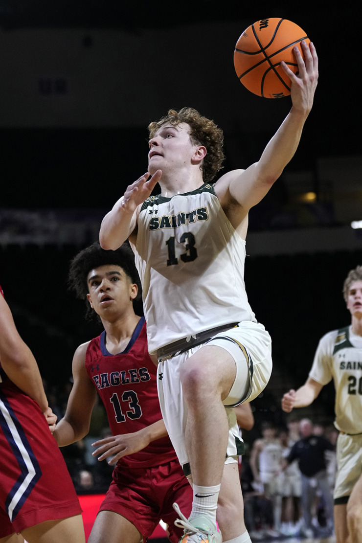 <strong>Briarcrest Christian guard Cooper Haynes, center, drives against Brentwood Academy during the first half of the Division II-AA championship basketball game Saturday, March 2, 2024, in Cookeville, Tenn</strong>. (Mark Humphrey/Special to The Daily Memphian)
