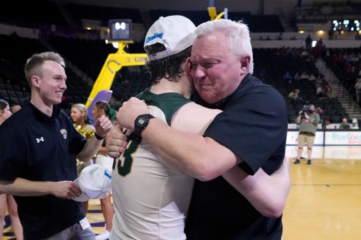 <strong>Briarcrest Christian head coach John Harrington hugs guard Cooper Haynes (13) after defeating Brentwood Academy in the Division II-AA championship basketball game Saturday, March 2, 2024, in Cookeville, Tenn.</strong> (Mark Humphrey/Special to The Daily Memphian)