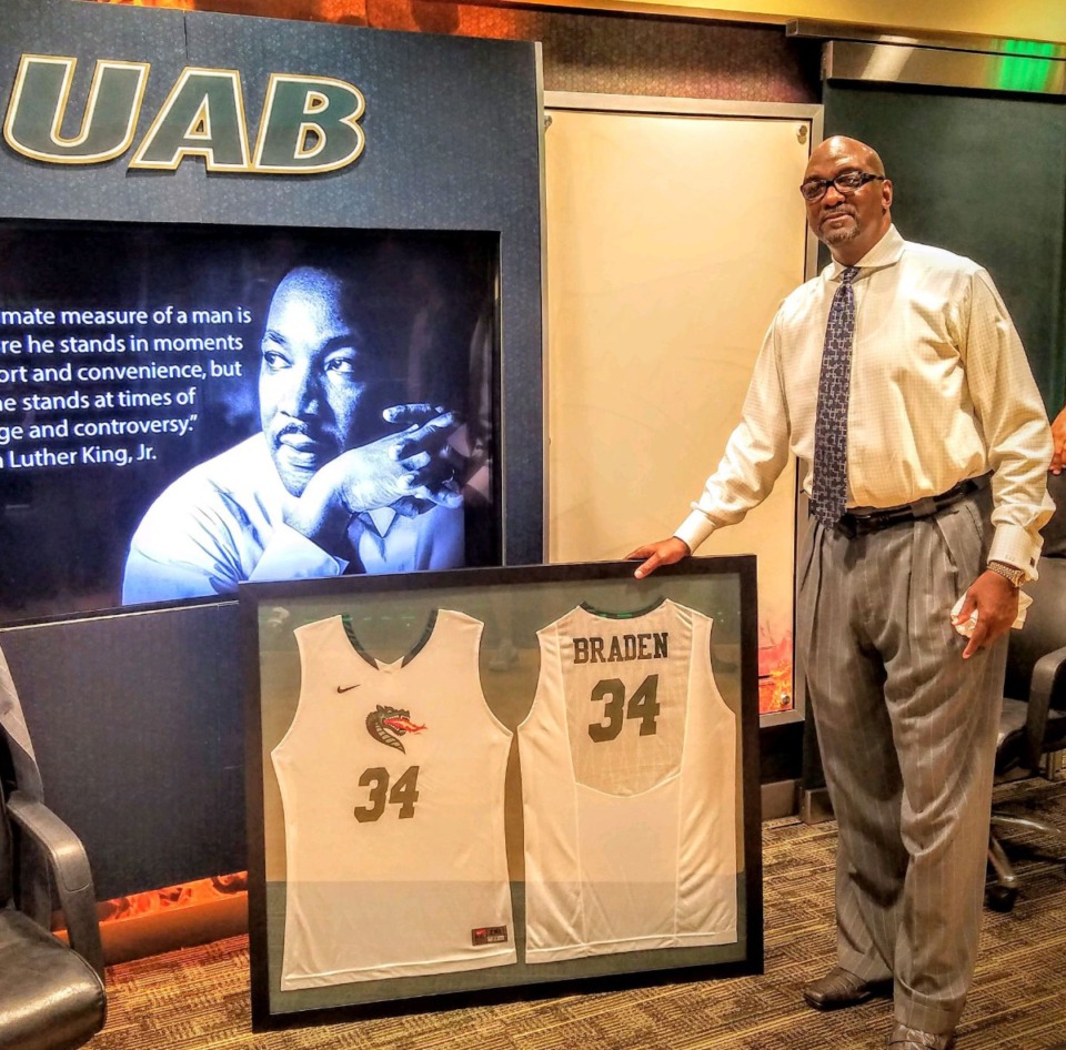 <strong>Daryl Braden had a proud moment at the University of Alabama-Birmingham&nbsp;after being presented with a framed jersey.</strong>&nbsp;(Courtesy Steve Mitchell)