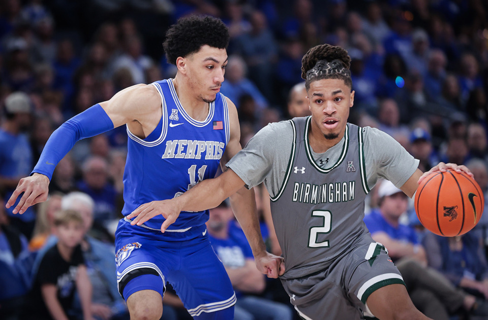 <strong>Memphis guard Jahvon Quinerly (11) guards UAB's Daniel Ortiz (2) during the Tigers win over the Blazers, March 3, 2024.</strong> (Patrick Lantrip/The Daily Memphian)