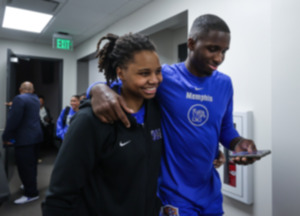 <strong>Memphis forward David Jones hugs his sister, Flor Jones, after the Tigers game against UAB on March 3, 2024.</strong> (Patrick Lantrip/The Daily Memphian)
