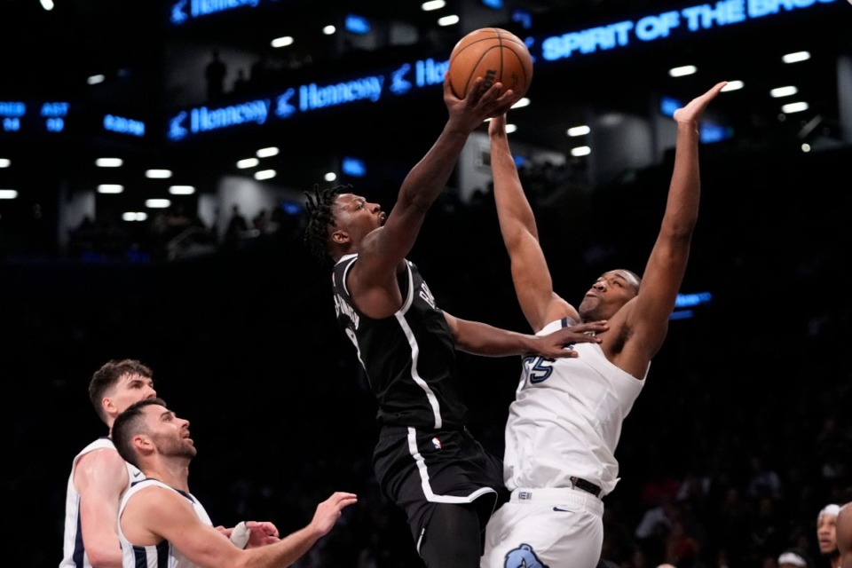 <strong>Memphis Grizzlies center Trey Jemison contests a shot by the Brooklyn Nets' Dorian Finney-Smith on Monday, March 4, 2024, in New York.</strong> (Frank Franklin II/AP)