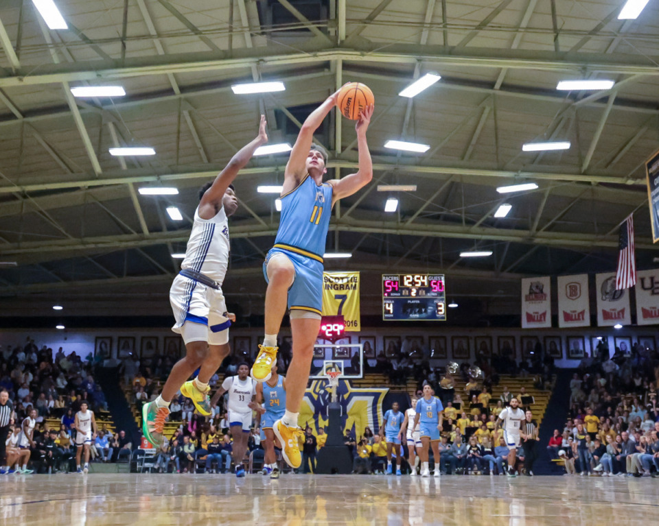<strong>Murray State&rsquo;s Justin Morgan, from Bartlett, heads to the basket during a November 2023 game against Brescia at Racer Arena in Murray, Kentucky.</strong> (Courtesy Murray State Athletics)