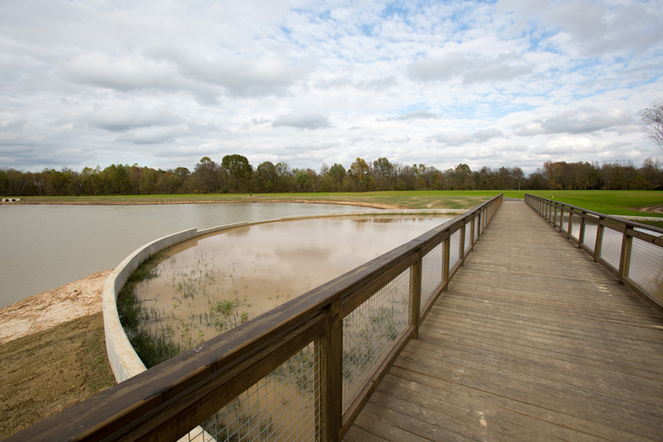 <strong>A bridge spans a wetlands preservation at Hinton Park in Collierville.</strong> (The Daily Memphian file)