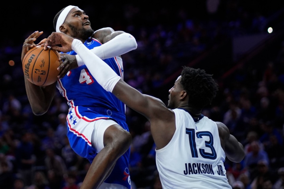 <strong>Memphis Grizzlies forward Jaren Jackson Jr., right, blocks a shot by Philadelphia 76ers' Paul Reed on March 6, 2024, in Philadelphia.</strong> (Matt Slocum/AP)