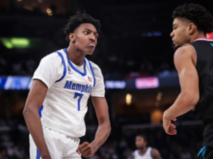 <strong>University of Memphis forward Nae'Qwan Tomlin, 7, stares down the FAU defense during a Feb. 25 game.</strong> (Patrick Lantrip/The Daily Memphian)