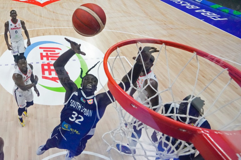<strong>South Sudan forward Wenyen Gabriel (32) shoots during their Basketball World Cup classification match against Angola at the Araneta Coliseum, Manila, Philippines on Saturday Sept. 2, 2023.</strong> (AP Photo/Aaron Favila,pool)