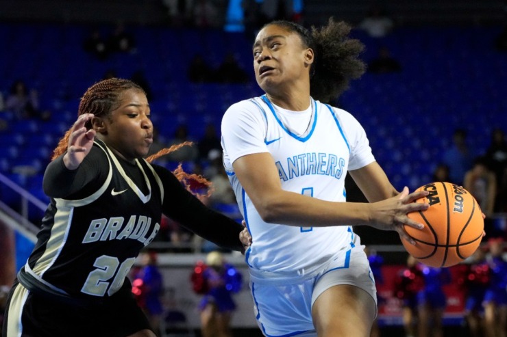 <strong>Bartlett's Carrington Jones (1) drives against Bradley Central's Malia Wilcox (20) during the first half of the Class 4A championship basketball game Saturday, March 9, 2024, in Murfreesboro, Tenn.</strong> (Mark Humphrey/Special to The Daily Memphian)