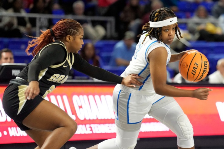 <strong>Bartlett's Shamari Hamlett (right) dribbles past Bradley Central's Malia Wilcox during the first half of the Class 4A championship basketball game Saturday, March 9, 2024, in Murfreesboro, Tenn.</strong> (Mark Humphrey/Special to The Daily Memphian)