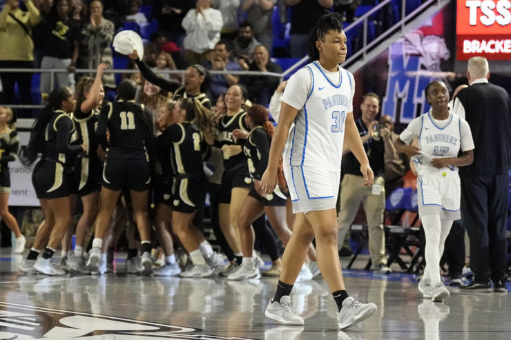 <strong>Bartlett's Samiya Jones (31) leaves the court as Bradley Central players celebrate after the Class 4A championship basketball game March 9 in Murfreesboro, Tenn.</strong> (Mark Humphrey/Special to The Daily Memphian)