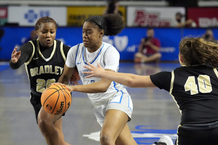 <strong>Bartlett's Carrington Jones (1) drives between Bradley Central's Malia Wilcox (20) and Addie Geren (40) during the first half of the Class 4A championship basketball game March 9 in Murfreesboro, Tenn.</strong> (Mark Humphrey/Special to The Daily Memphian)