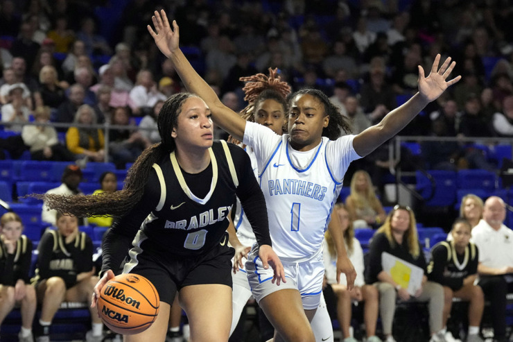 <strong>Bartlett's Carrington Jones (1) defends against Bradley Central's Kimora Fields (0) during the first half of the Class 4A championship basketball game March 9 in Murfreesboro, Tenn.</strong> (Mark Humphrey/Special to The Daily Memphian)