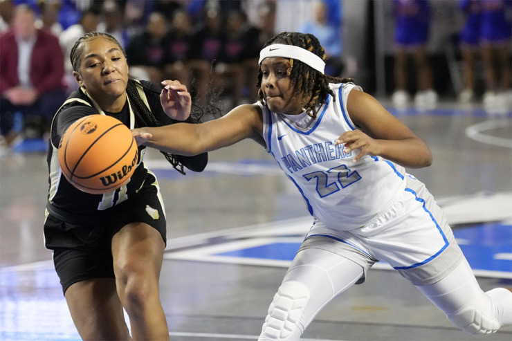 <strong>Bartlett's Shamari Hamlett (22) reaches for the ball with Bradley Central's Harmonie Ware (11) during the first half of the Class 4A championship basketball game March 9 in Murfreesboro, Tenn.</strong> (Mark Humphrey/Special to The Daily Memphian)