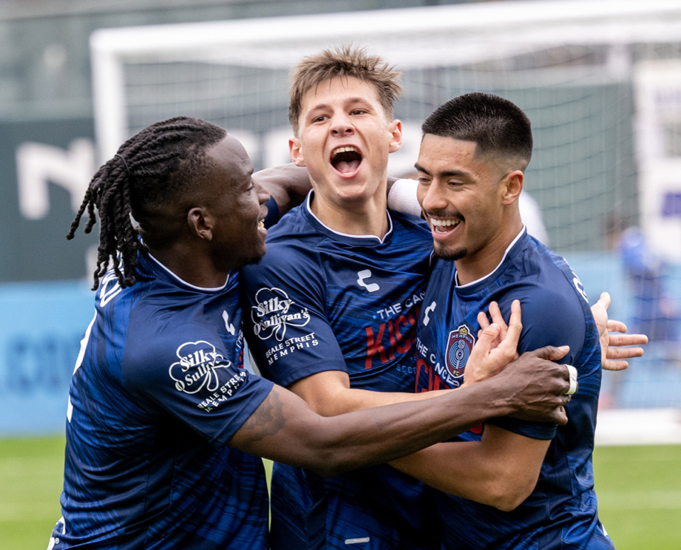 <strong>Nighte Pickering (center) celebrates after scoring, with teammates, Tulu and Alvaro Quezada at AutoZone Park, Saturday, March 9, 2024. Memphis 901 FC went on to defeat Las Vegas 2-1.</strong> (Greg Campbell/Special to The Daily Memphian)