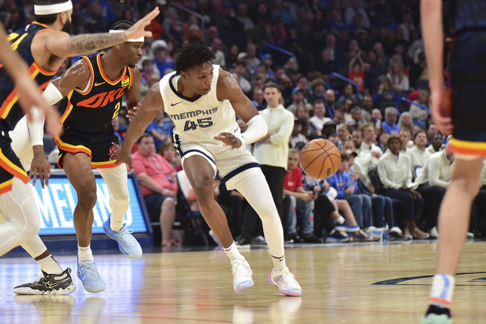 <strong>Memphis Grizzlies forward GG Jackson (45) battles Oklahoma City Thunder guard Shai Gilgeous-Alexander (2) for the ball during Sunday&rsquo;s game in Oklahoma City. Jackson poured in a career-high 30 points in the game.</strong>&nbsp;(Kyle Phillips/AP Photo)