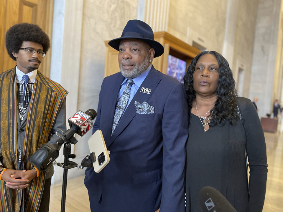 <strong>Mother RowVaughn Wells, right, and stepfather Rodney Wells, center, speak at the Tennessee Capitol on Thursday, March 14, in opposition to a bill that would rescind some policing changes made in Memphis after their son, Tyre Nichols, died following a police beating in January 2023. Rep. Justin J. Pearson, left, introduced them at the news conference.</strong> (Jonathan Mattise/AP Photo)
