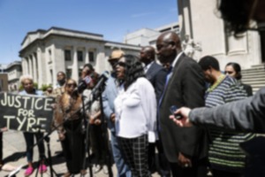 <strong>RowVaughn Wells, (middle) mother of Tyre Nichols, speaks to the media on Wednesday, April 19, 2023, after announcing a $550 million civil lawsuit against the City of Memphis, Memphis Police Department, and individual officers for the January 2023 death of Nichols.</strong> (Mark Weber/The Daily Memphian file)