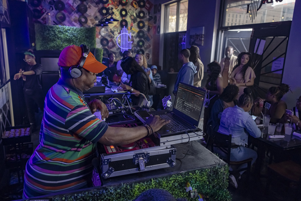 <strong>DJ 1 Luv spins music at The Genre during 2024 Black Restaurant Week in Downtown Memphis on Sunday, March 17.</strong> (Ziggy Mack/Special to The Daily Memphian)