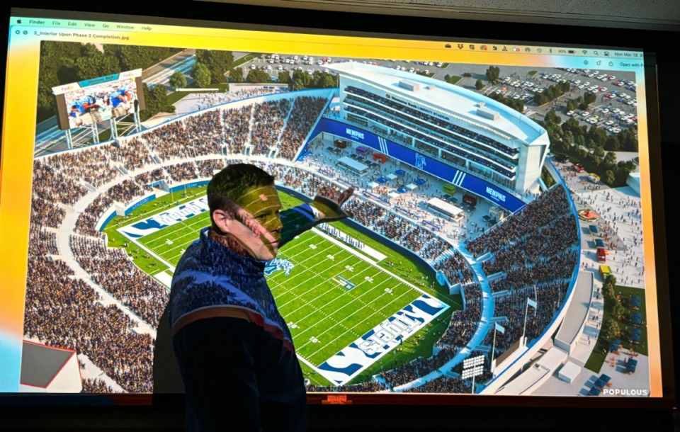 <strong>Pointing at a planned party plaza, Memphis athletic director Laird Veatch offers a peek at a Simmons Bank Liberty Stadium renovation rendering.</strong> (Tim Buckley/The Daily Memphian)