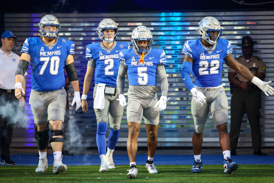 <strong>The captains of the University of Memphis Tigers football team take the field before the game against Tulane University on Oct. 13, 2023, at Simmons Bank Liberty Stadium.</strong> (Wes Hale/The Daily Memphian file)&nbsp;