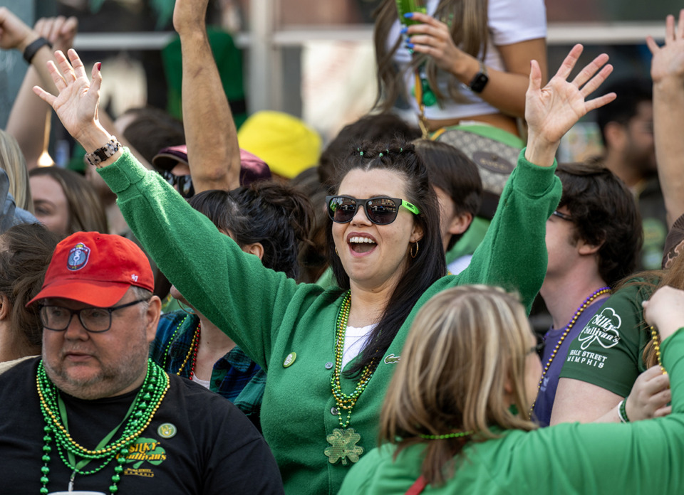 <strong>Melanie Marshall watches as the parade passes in front of Silky O'Sullivan's at the 51st Annual Silky Sullivan St. Patricks's Parade March 16 on Beale Street.</strong> (Greg Campbell/Special to The Daily Memphian)