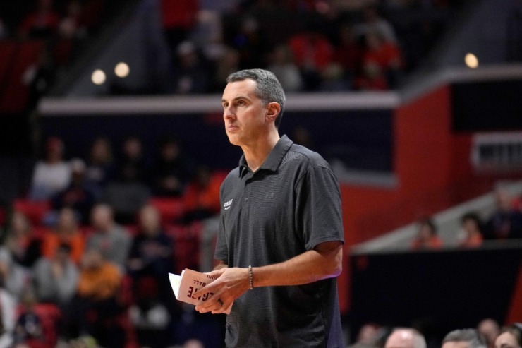 <strong>Colgate head coach Matt Langel watches his team during the first half of an NCAA college basketball game against Illinois Sunday, Dec. 17, 2023, in Champaign, Ill.</strong> (AP Photo/Charles Rex Arbogast)