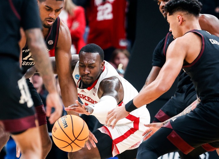<strong>Nebraska forward Juwan Gary (middle) battles for a loose ball against Texas A&amp;M in the NCAA Tournament game on Friday, March 22, 2024.</strong> (Mark Weber/The Daily Memphian)