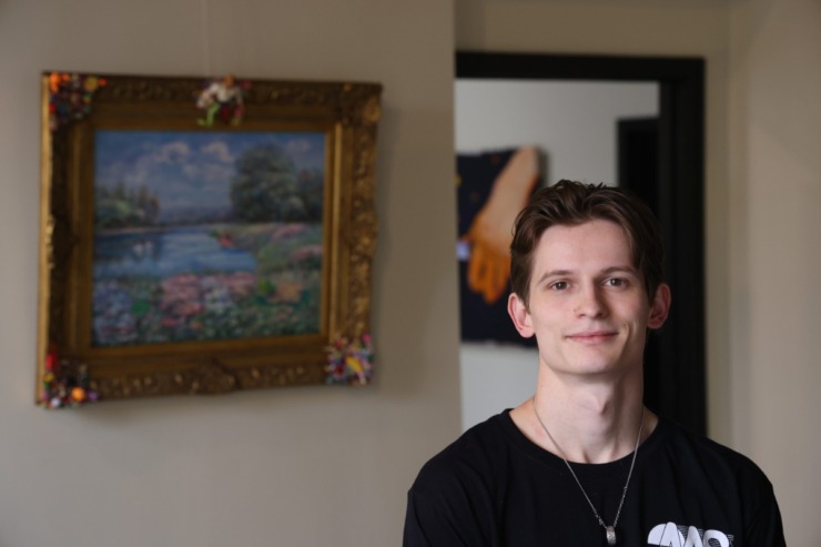 Co-owner/art director Cameron Hansom poses inside Memphis Art Salon's first official art gallery at Minglewood Hall. (Brad Vest/Special to The Daily Memphian)