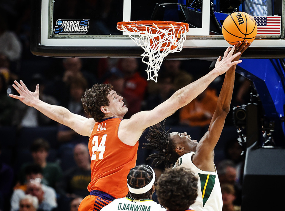 <strong>Clemson defender PJ Hall (24) fouls Baylor guard Ja'Kobe Walter, right, during action in the NCAA Tournament on Sunday, March 24, 2024.</strong> (Mark Weber/The Daily Memphian)