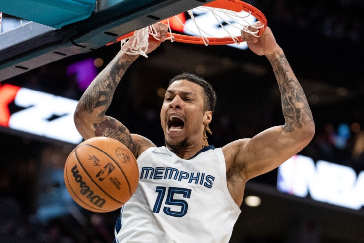 Memphis Grizzlies forward Brandon Clarke dunks against the Charlotte Hornets during a February 2022 NBA basketball game in Charlotte. (AP Photo/Jacob Kupferman)
