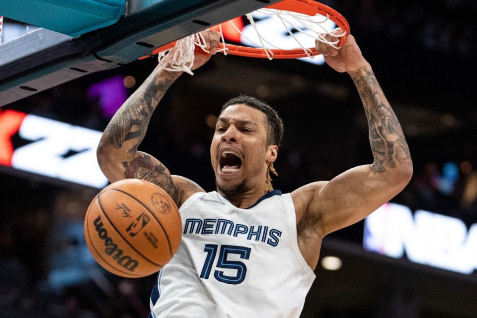 <strong>Memphis Grizzlies forward Brandon Clarke dunks against the Charlotte Hornets during a February 2022 NBA basketball game in Charlotte.</strong> (AP Photo/Jacob Kupferman)