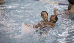 <strong>Olympic swimmer Gabrielle Rose works with a child at the University of Memphis aquatic center in March. The County Commission voted Monday to override Mayor Lee Harris' veto of a $1 million allocation to help create the Mike Rose Natatorium, named for Gabrielle's late father.&nbsp;</strong>(Photo courtesy of Lisa Buser)