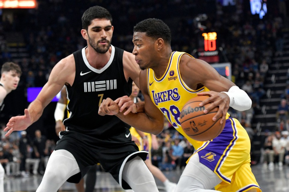 <strong>Los Angeles Lakers forward Rui Hachimura (28) drives against Memphis Grizzlies forward Santi Aldama (7) on Wednesday, March 27, 2024.</strong> (Brandon Dill/AP)