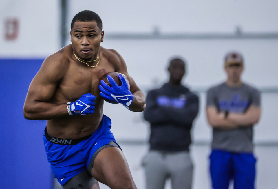 <strong>University of Memphis running back Blake Watson runs agility drills for NFL scouts at the school's Pro Day March 28.</strong> (Patrick Lantrip/The Daily Memphian)