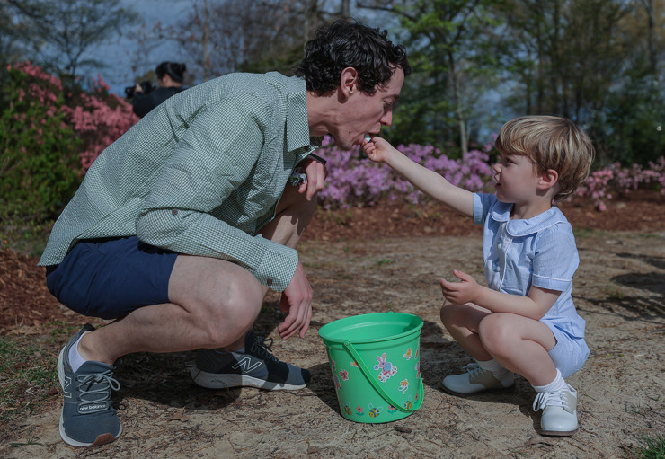 <strong>Four-year-old Emerson feeds his dad, Andrew, some of his Easter candy at the Dixon March 30.</strong> (Patrick Lantrip/The Daily Memphian)