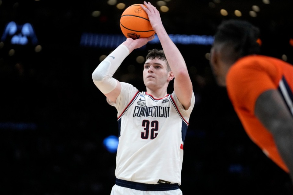 <strong>UConn center Donovan Clingan (32) takes a foul shot during the first half of the Elite 8 college basketball game against the Illinois in the men's NCAA Tournament, Saturday, March 30, 2024, in Boston.</strong> (AP Photo/Steven Senne)