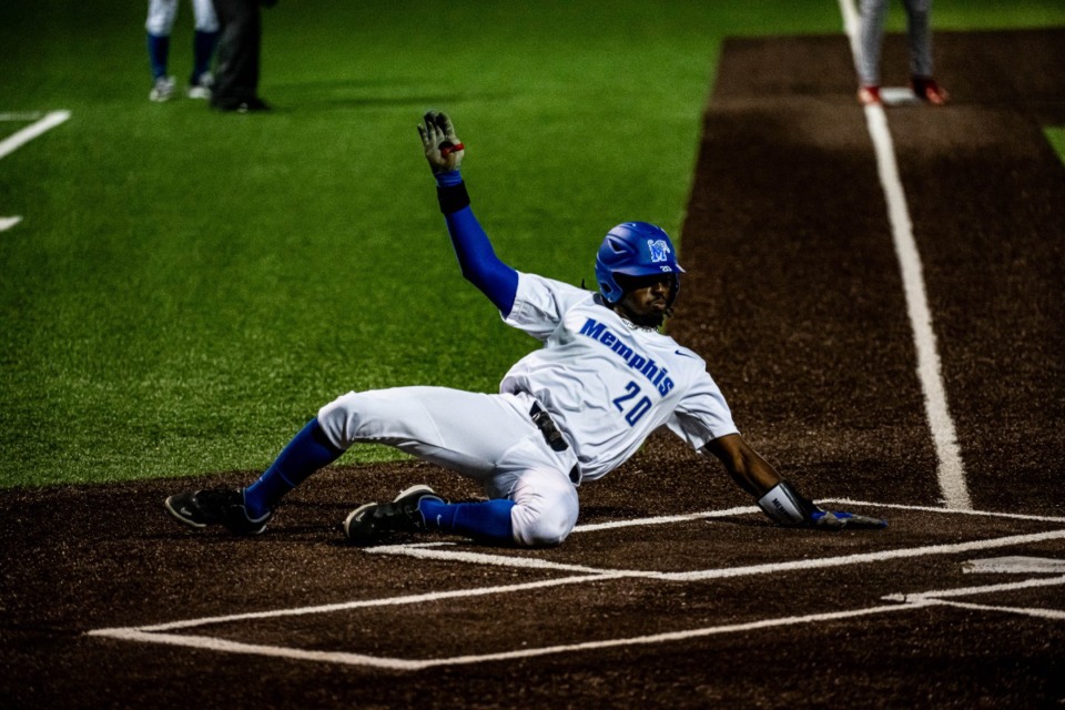 <strong>Memphis Tigers infielder Daunte Stuart (20) crosses the plate during the Memphis-Arkansas State game March 13. He is the fourth Tiger since 2001 to hit for the cycle in a single game.</strong> (Courtesy Matt Smith/Memphis Athletics.)
