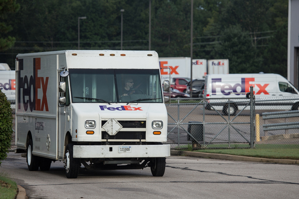 <strong>FedEx Corp.'s contract with the United</strong> <strong>States Postal Service is ending and rival transportation giant United Parcel Service is taking over. Trucks depart FedEx Ship Center on Appling Road.</strong> (The Daily Memphian file)