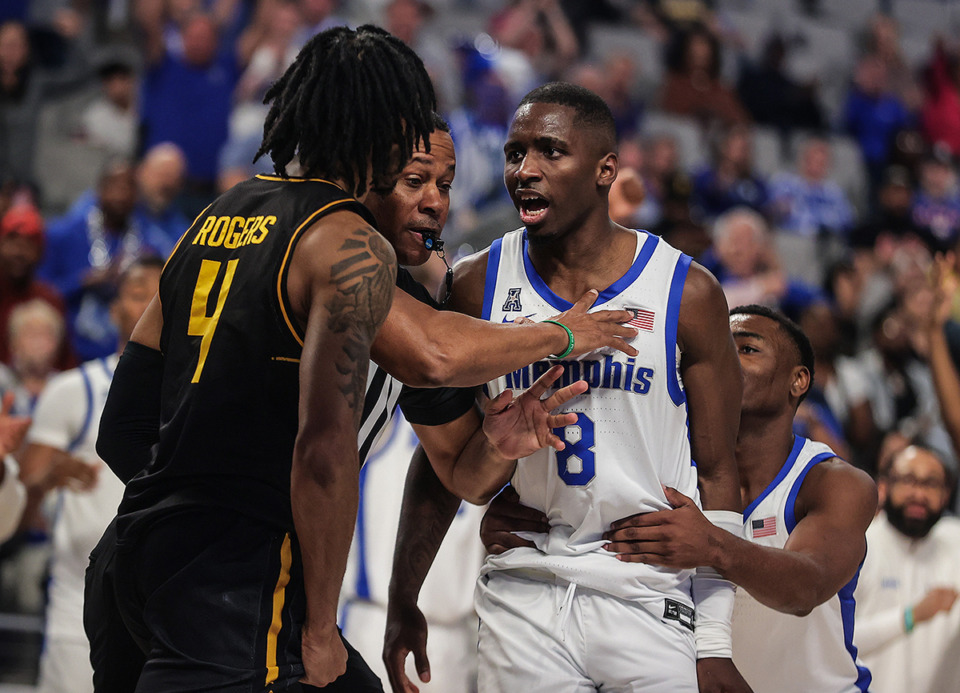 <strong>University of Memphis forward David Jones (8) reacts to getting pushed by Wichita State guard Colby Rogers (4) during an AAC Tournament game in Fort Worth, Texas, March 14.</strong> (Patrick Lantrip/The Daily Memphian)