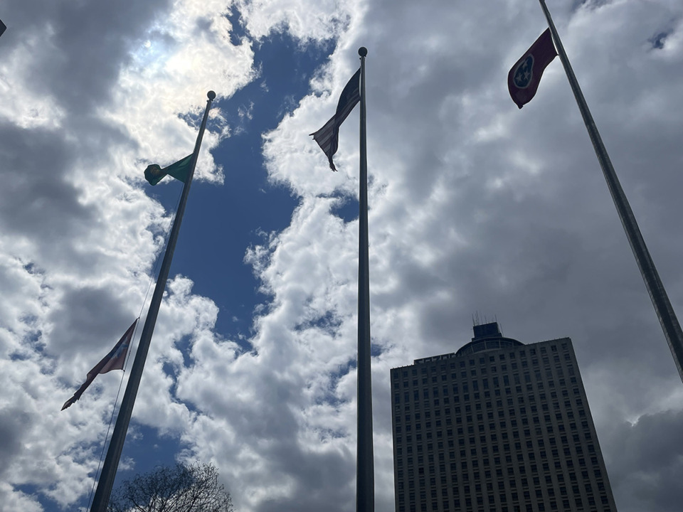 <strong>A flag dedicated to three children who lost their lives to abuse and neglect was raised over Civic Center Plaza during a ceremony hosted by the Memphis Child Advocacy Center Wednesday, April 3, 2024.</strong> (Julia Baker/The Daily Memphian)