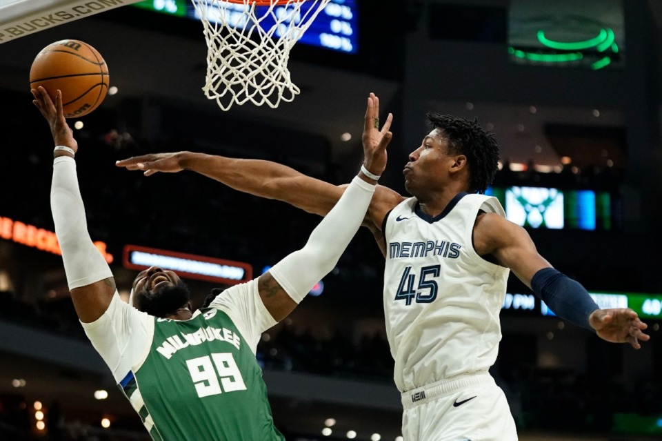 <strong>Memphis Grizzlies' GG Jackson (45) tries to block the shot of Milwaukee Buck Jae Crowder (99) Wednesday, April 3, 2024, in Milwaukee.</strong> (Aaron Gash/AP)