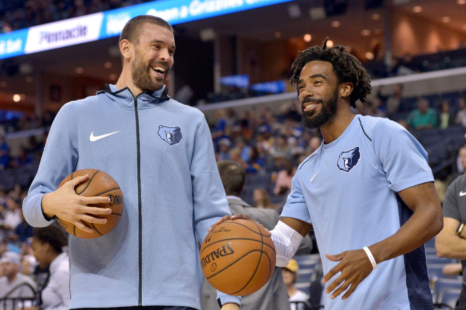<strong>Memphis Grizzlies center Marc Gasol, left, and guard Mike Conley laugh as they warmup before an NBA basketball game against the Golden State Warriors Saturday, Oct. 21, 2017, in Memphis. The entire Core Four (Gasol, Conley, Tony Allen and Zach Randolph) may gather Saturday when the Grizzlies retire Gasol&rsquo;s jersey.</strong> (AP File Photo/Brandon Dill)
