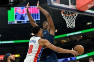 <strong>Detroit Pistons guard Jared Rhoden (8) passes around Memphis Grizzlies center Trey Jemison on Friday, April 5, 2024.</strong> (Brandon Dill/AP)