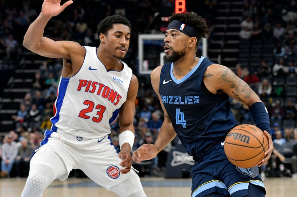 <strong>Memphis Grizzlies guard Jordan Goodwin (4) charges past Detroit Pistons guard Jaden Ivey (23) on Friday, April 5, 2024.</strong> (Brandon Dill/AP)