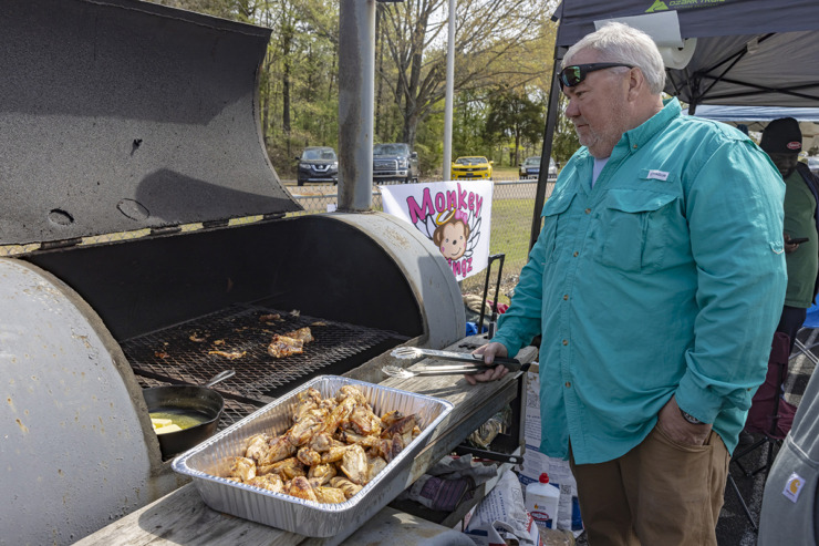 <strong>David Tullos of people&rsquo;s choice team Monkey Wingz prepares hot wings at the DeSoto County Wings and Ribs Festival in Olive Branch April 6.</strong> (Ziggy Mack/Special to The Daily Memphian)
